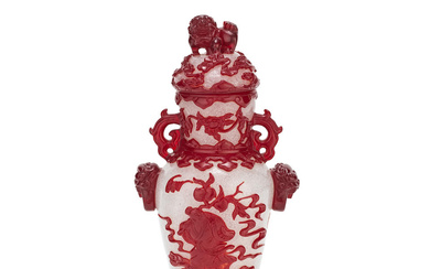 A RED-OVERLAY PEKING GLASS 'SHOULAO AND MAGU' VASE AND COVER...