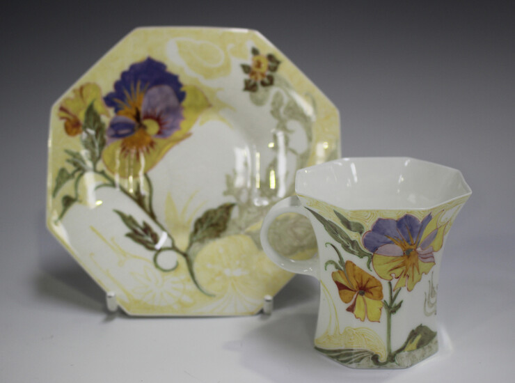 A Rozenburg den Haag eggshell porcelain coffee cup and saucer, circa 1908, painted with flowers, pri