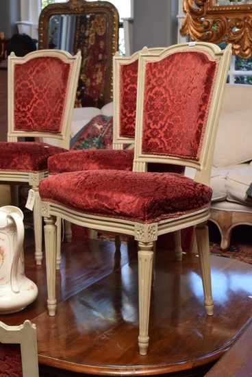 A SET OF EIGHT FRENCH DINING CHAIRS IN RED VELVET UPHOLSTERY