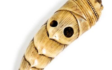 A STAG ANTLER NETSUKE OF A BAMBOO SHOOT.