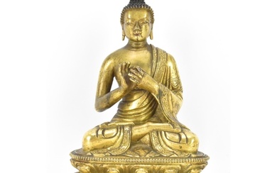 A Sino Tibetian gilt bronze figure of Buddha, 18th/19th cent...