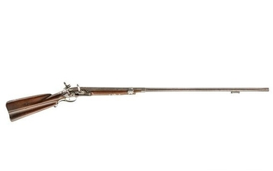 A Spanish silver-mounted Miquelet flintlock shotgun