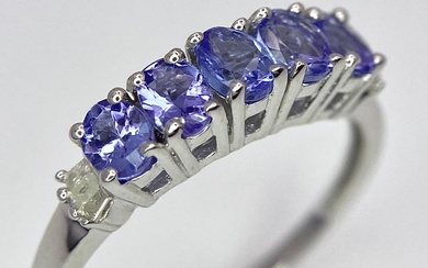 A Tanzanite and Diamond Ring. Set in 925 silver....