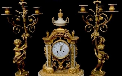 A VERY FINE DORE BROZE AND WHITE MARBLE CLOCK SET