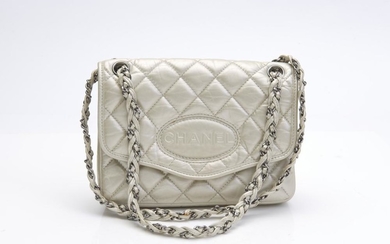 A VINTAGE FLAP BAG BY CHANEL