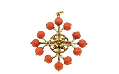 A Victorian coral pendant, stylized cross with a central flower and each arm terminating in a round