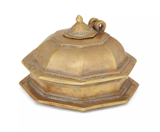 A brass inkwell, North India, 19th century, of octagonal shape,...