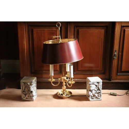 A brass three branch Desk Lamp, with metal shade on circular...