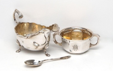 A cased silver porringer and spoon, the porringer Birmingham, c.1930, William Greenwood & Sons, the spoon by the Adie Brothers, Birmingham, c.1930, both engraved with monogram, together with a silver gravy boat, Birmingham, c.1927, William...