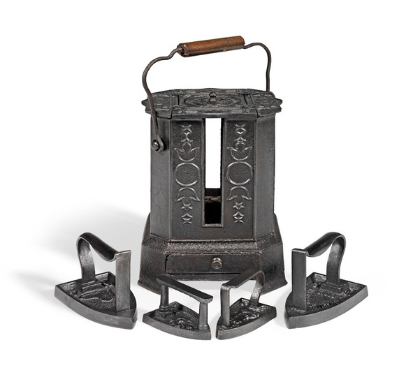 A cast iron portable garret stove for irons, French, circa 1890-1900