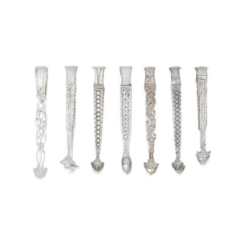 A collection of 18th century silver and mother of pearl sugar tongs