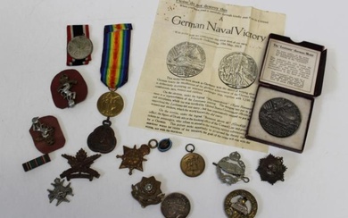 A collection of medals comprising a German 1937 medal for...