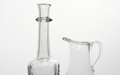 A cruciform decanter or serving bottle c.1740, the heavy base...