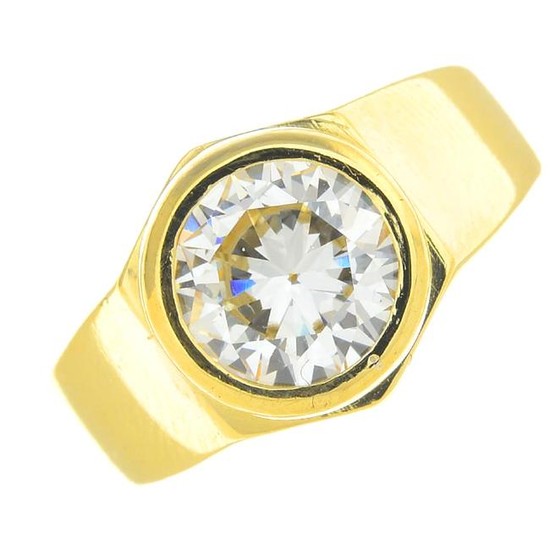 A diamond single-stone ring. The circular-cut diamond
