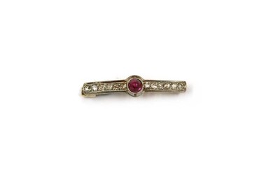 A gold ruby and diamond bar brooch