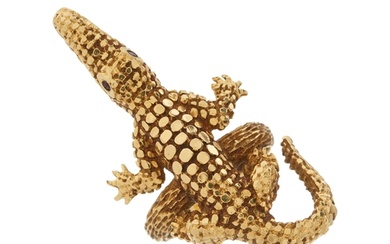A gold textured dress ring, designed as an alligator, with r...