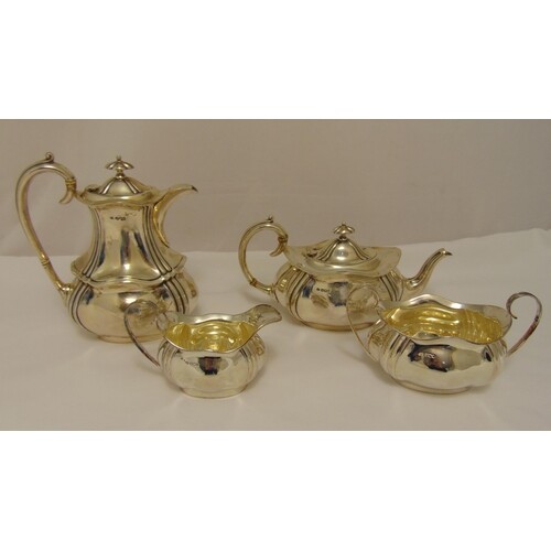 A hallmarked silver four piece tea and coffee set, shaped ov...