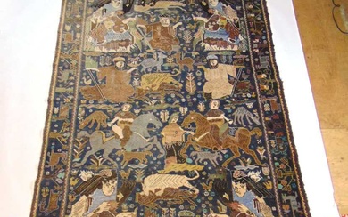 A handwoven Caucasian rug, the main border with animal motifs,...