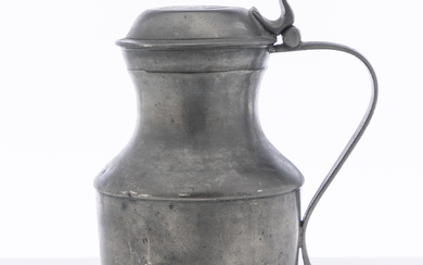A large and impresssive antique Irish pewter lidded tankard, marked...