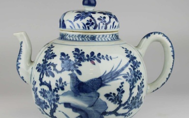 A large blue and white teapot