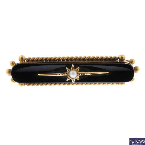 A late 19th century gold onyx and split pearl bar brooch.
