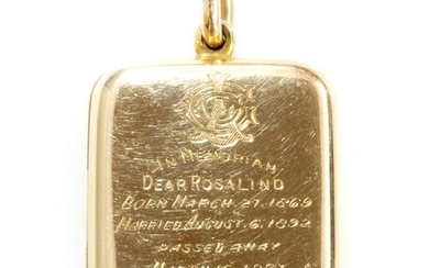 A late Victorian gold rectangular cushion-shaped hinged locket