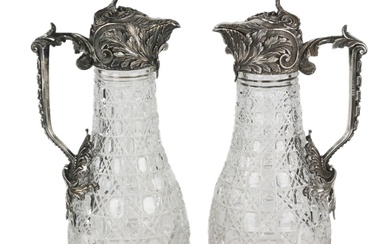A magnificent pair of cast crystal wine jugs in superb...