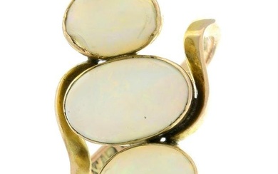 A mid 20th century opal three-stone crossover ring.
