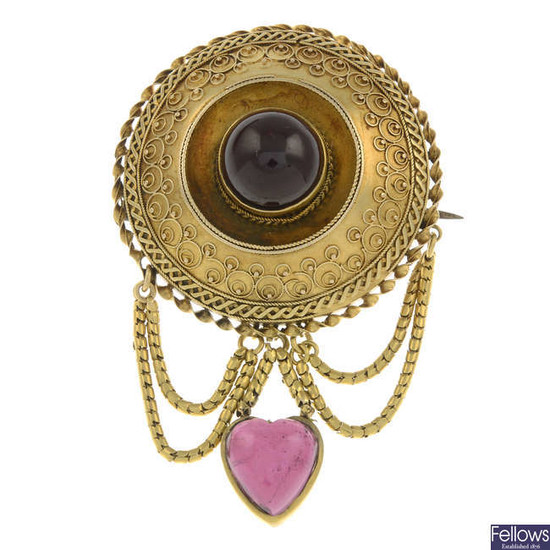 A mid to late Victorian gold garnet brooch.