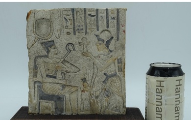 A mounted Egyptian carved Limestone relief 19 x 17 cm.
