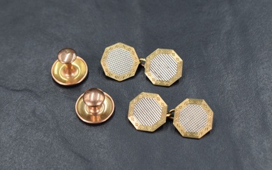 A pair of 18ct and 9ct gold cufflinks of octagonal form having a central white gold octagon with a