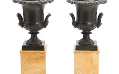 A pair of 19th century urn shaped patinated bronze brûle-parfumes on Siena marble base. H. 40 cm. (2)