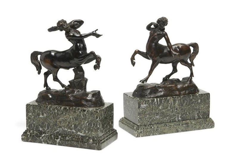 A pair of bronze figures of centaurs