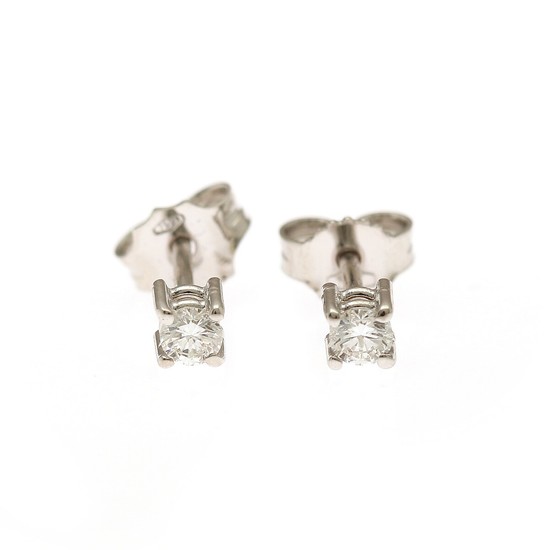 A pair of diamond solitaire ear studs each set with a brilliant-cut diamonds totalling app. 0.23 ct., mounted in 18k white gold. (2)