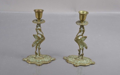 A pair of early 20th Century brass 'Liverbird' candlesticks