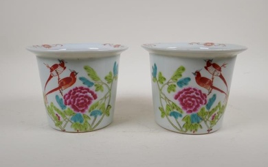 A pair of famille rose porcelain flower planters decorated...