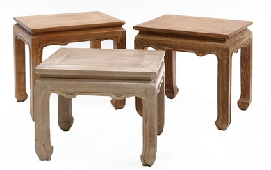 A pair of modern hardwood low tables