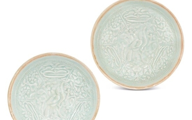 A pair of moulded qingbai 'bird and floral' bowls, Song dynasty 宋 青白釉印花鳥紋斗笠盌一對
