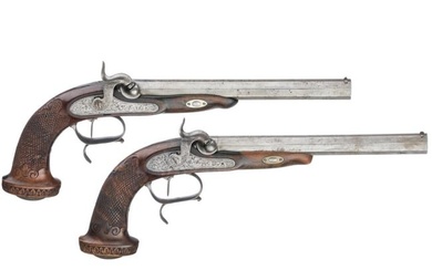 A pair of percussion pistols by Plomdeur à Paris, circa 1840