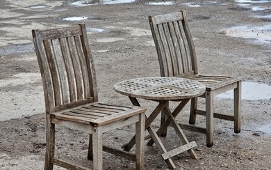 A pair of teak garden chairs with slatted seats and backs, H...