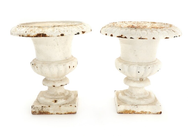 NOT SOLD. A pair of whitepainted iron garden urns. 20th century. H. 25 cm. (2)...
