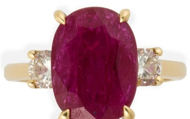 A ruby, diamond and eighteen karat gold ring