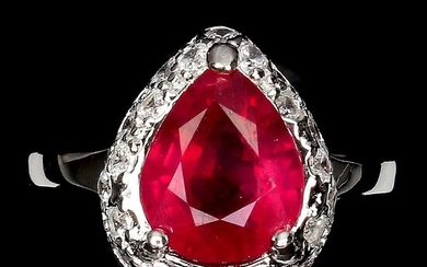 A ruby ring set with a pear shaed ruby weighing app. 3.50 ct., mounted in rhodium plated sterling silver. Size 54. This item is subject to full VAT Full VAT On this lot, a VAT of 25% is levied on the hammer price and the buyer’s premium. × Read...