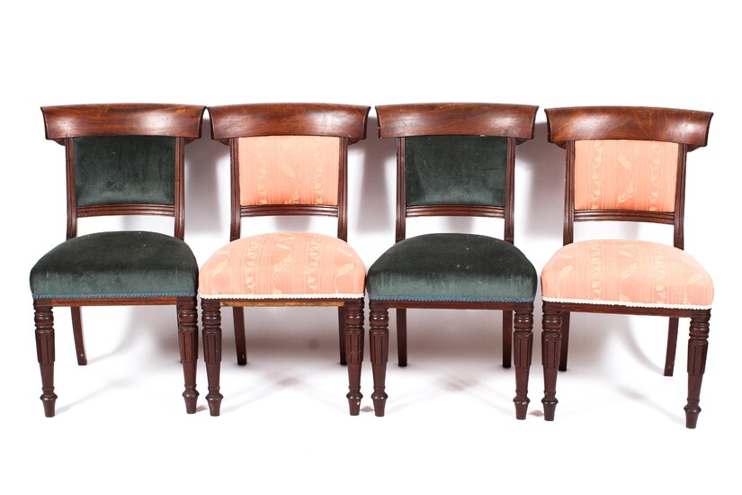A set of four William IV mahogany bar back dining chairs, each with scroll ornament to bar