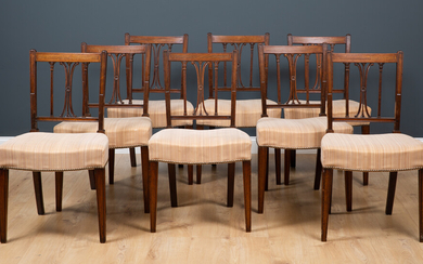 A set of twelve early George III mahogany dining chairs...