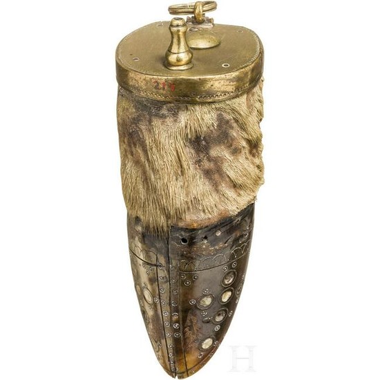 A silver inlaid powder flask made from a deer or mosse