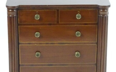 A small Regency mahogany chest / cupboard with turned