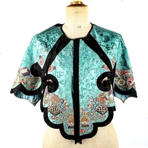 A superb 19th century Chinese silk cape with intricate embro...