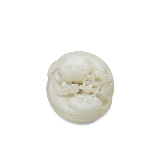 A white jade carving of two catfish