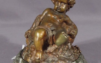 ANTIQUE FRENCH BRONZE SCULPTURE OF PUTTO ON ROCK